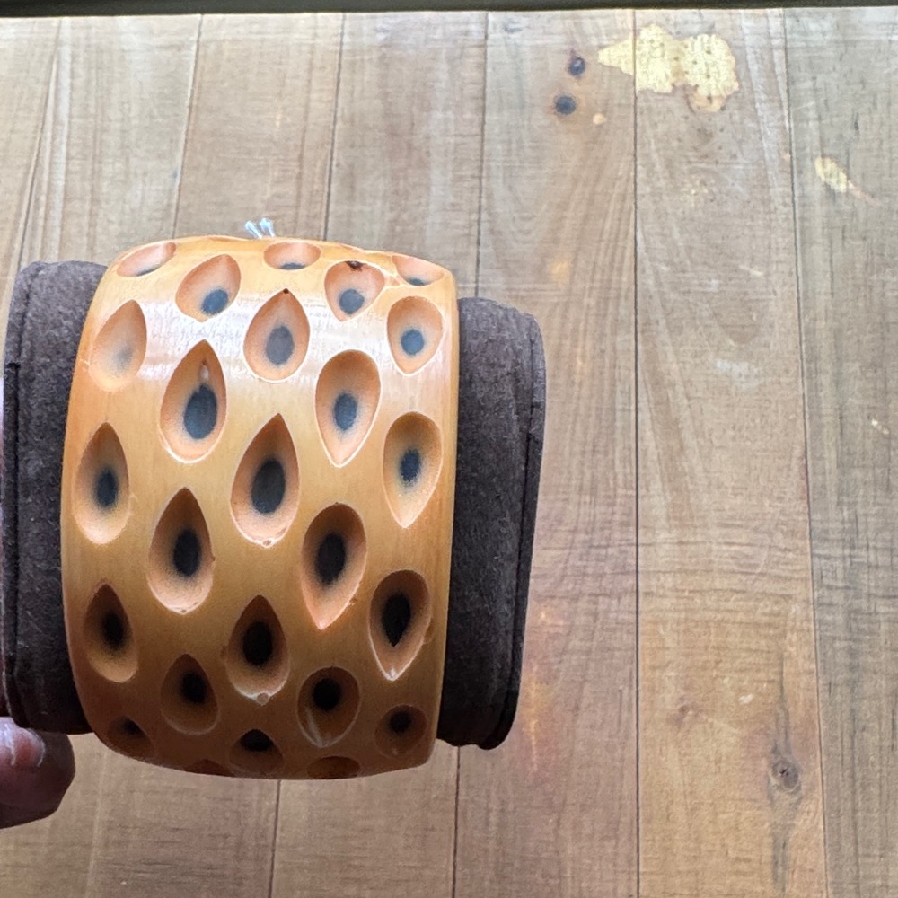 Carved Honey-Tone Wooden Bangle Bracelet with Cutout Teardrop Pattern